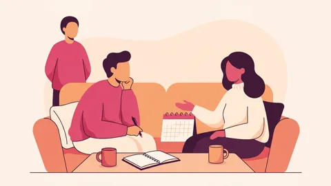 Two people on a couch talking calmly, a notebook and calendar on the table, and a third figure standing nearby.